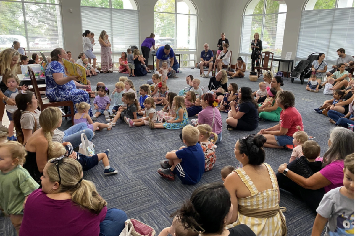 Community members reading and learning together